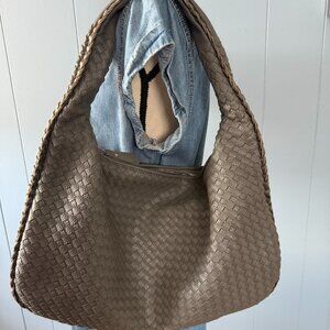 Woven leather handbag